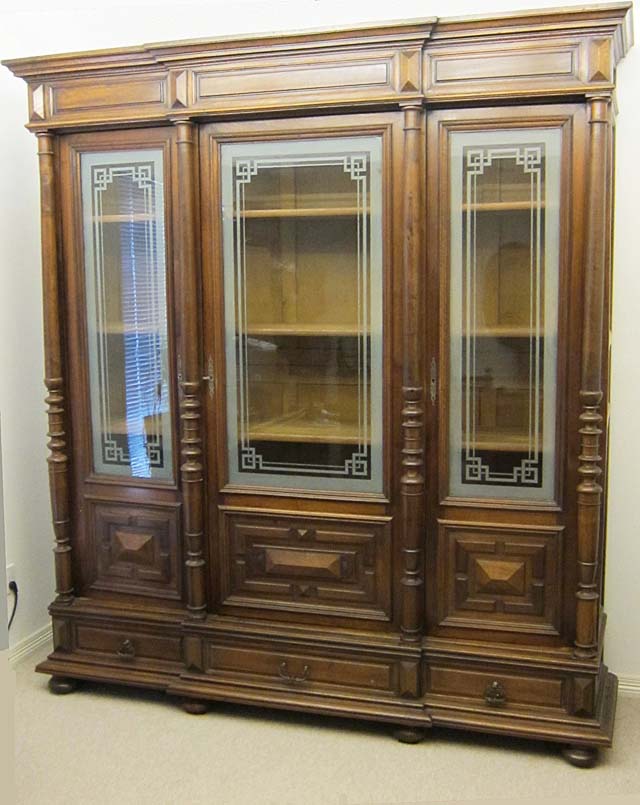 french antique cabinet or bookcase with glass doors
