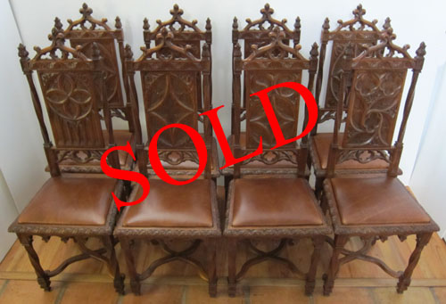 french antiques 8-gothic-dining-chairs-chestnut-leather