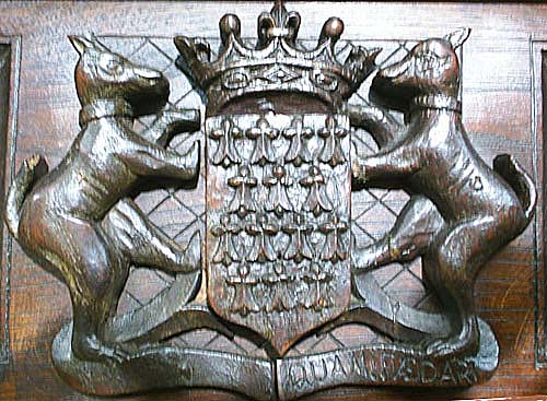 3091-breton coat-of-arms on antique cabinet