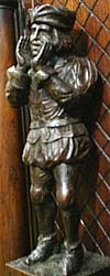 3091-statue on left side of cabinet