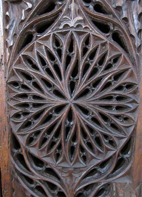 open tracery rosace on Gothic cabinet
