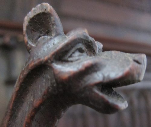 5112a-detail of carving of dog's head on gothic cabinet