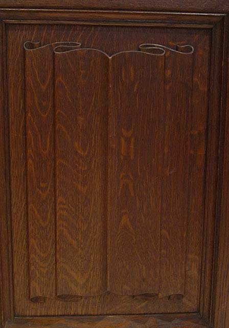 5193-carved linen fold panel on armoire