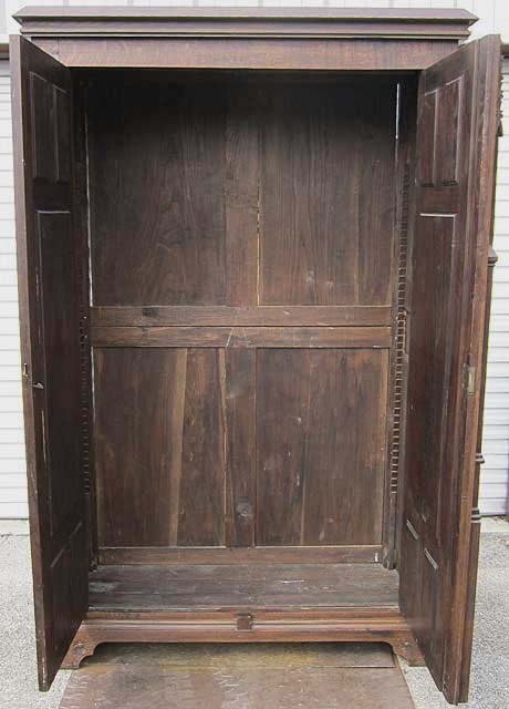 interior of gothic armoire without shelving