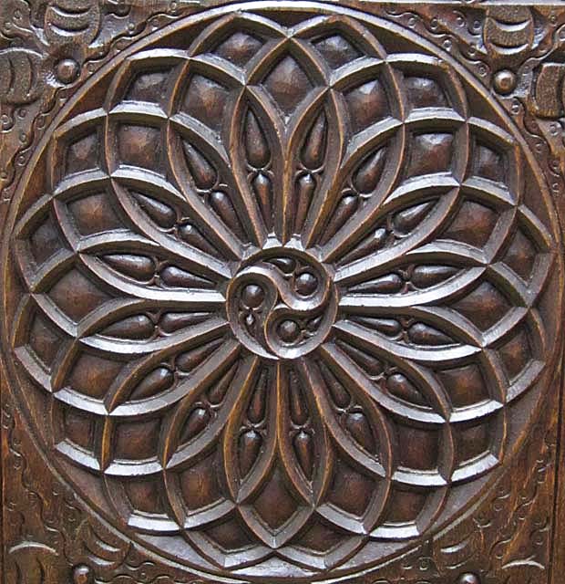 9452-detail of rose window motif on antique gothic buffet
