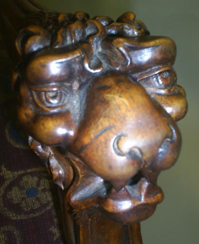 3109-face of carved lion on antique chair