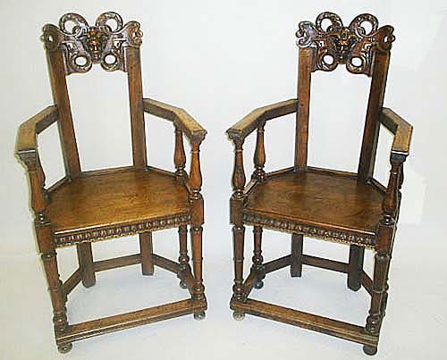 pair of French antique Gothic Caquetoires armchairs