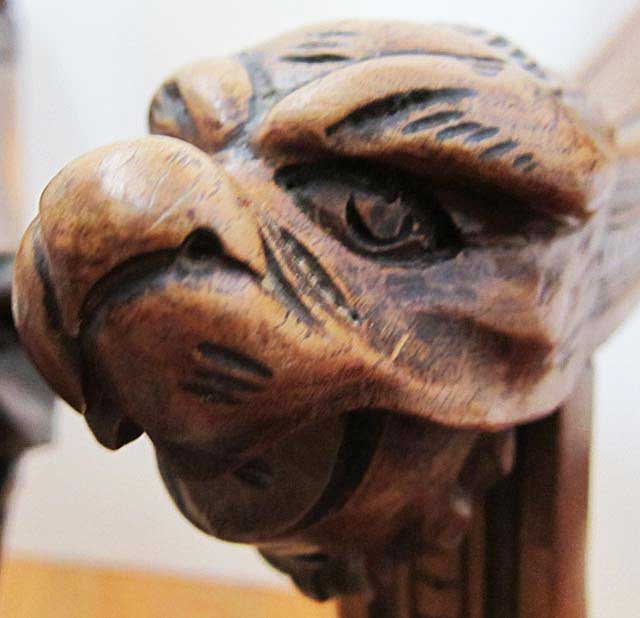 side of carved bird