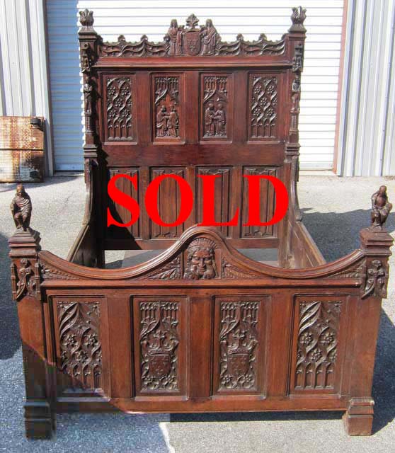 french gothic bed with elaborate carving