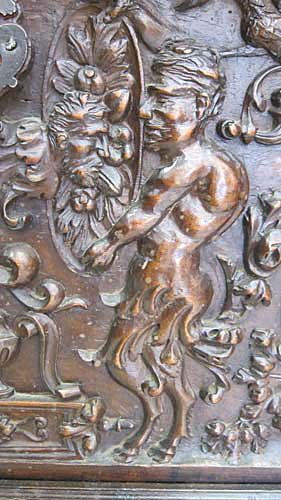 satyr on right of antique chest