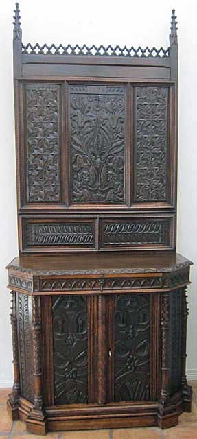 antique cabinet heavily carved
