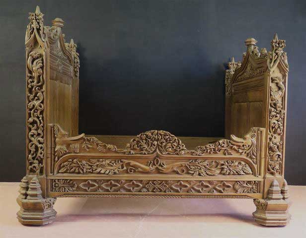 french gothic bed with animal figures