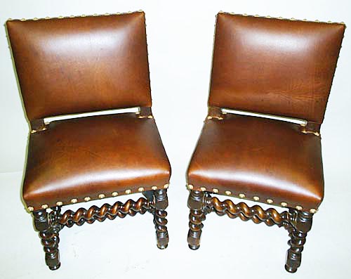 pair of antique dining chairs leather