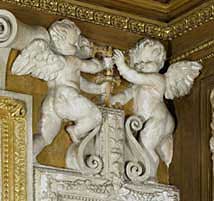 rosso putti over door