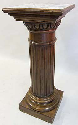 french antique column with marble top